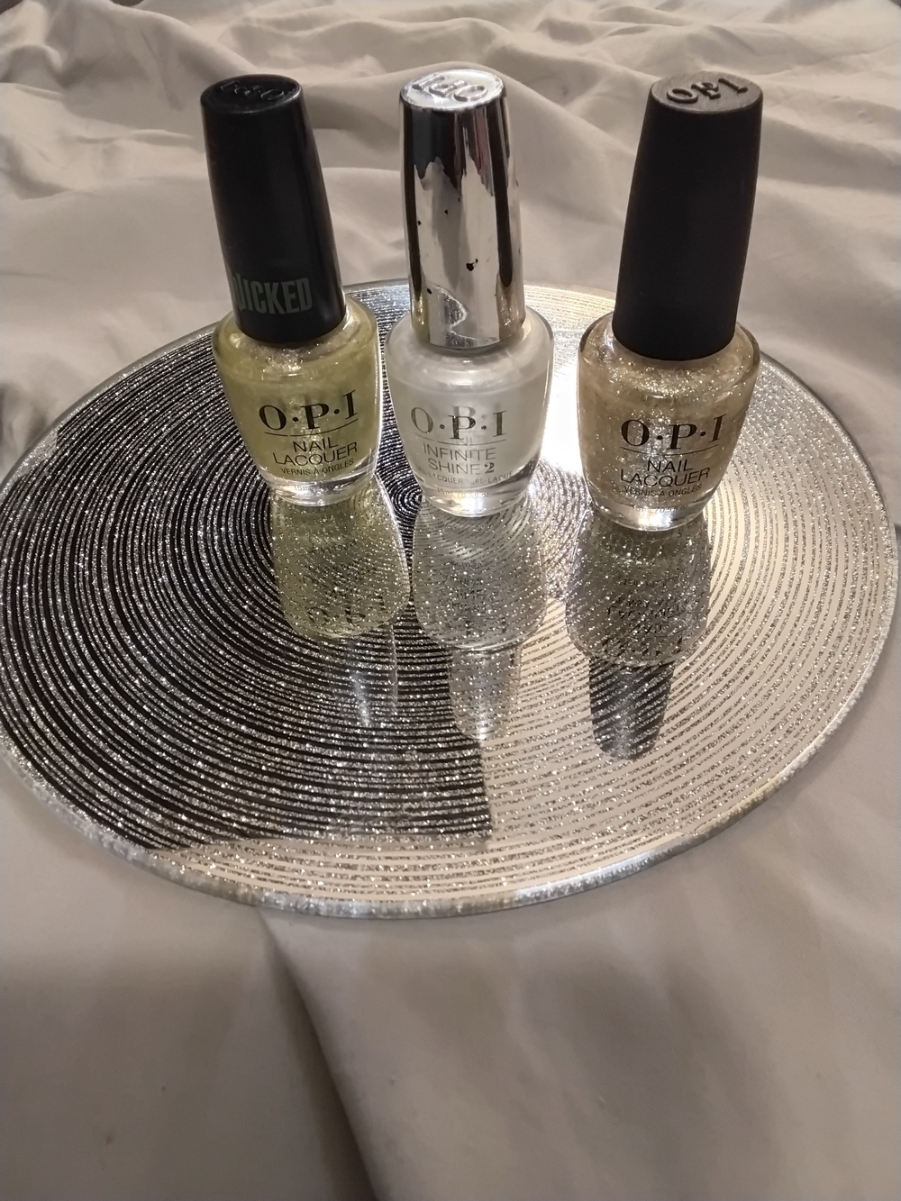 OPI Trio in White, Pale Yellow, Gold Glitter